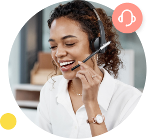 A woman in a white shirt talks to a customer using a hands-free headset.