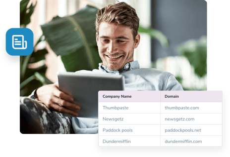 Reclining man checks out his list evaluator results with ZeroBounce’s comprehensive email APIs