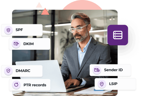 A man in a grey suit and white glasses sits in front of a window at his desk in front of a laptop next to these mail server terms: SPF, DKIM, DMARC, PTR records, Sender ID, and LSIP.