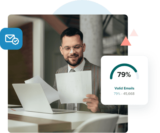 An attorney reviews a document at his desk in front of his laptop next to an image that shows 79% valid emails.