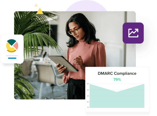 Standing woman holding and looking at her tablet surrounded by various charts, including one titled DMARC Compliance