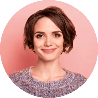 A woman with short brown hair wearing a colorful sweater smiles next to an email icon.